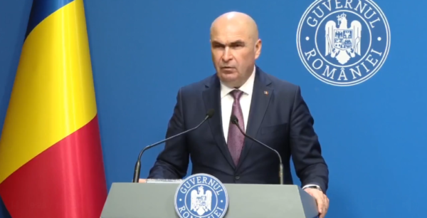 MotIunea de cenzura impotriva guvernului Ilie Bolojan ce va fi citita miercuri si votata pe 5 mai a obtinut cele mai multe semnaturi din ultimul deceniu Ce se va intampla daca executivul este invins la vot